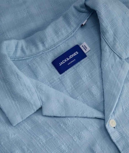 Camisa jacquard azul para hombre loose fit manga corta cuello bowling