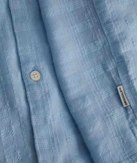 Camisa jacquard azul para hombre loose fit manga corta cuello bowling