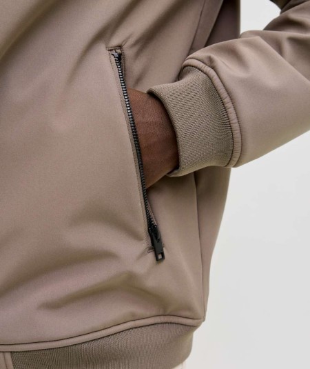 Chaqueta casual beige con puños acanalados